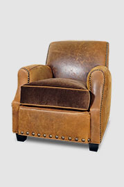 Howdy armchair in Burnham Sycamore leather with Cannes Mahogany velvet seat cushion